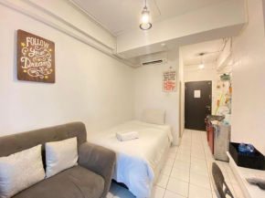 Cozy Studio Room at Grand Asia Afrika Apartment By Travelio